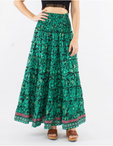 Long polyester ruffled skirt with elastic belt and "barka dore" print